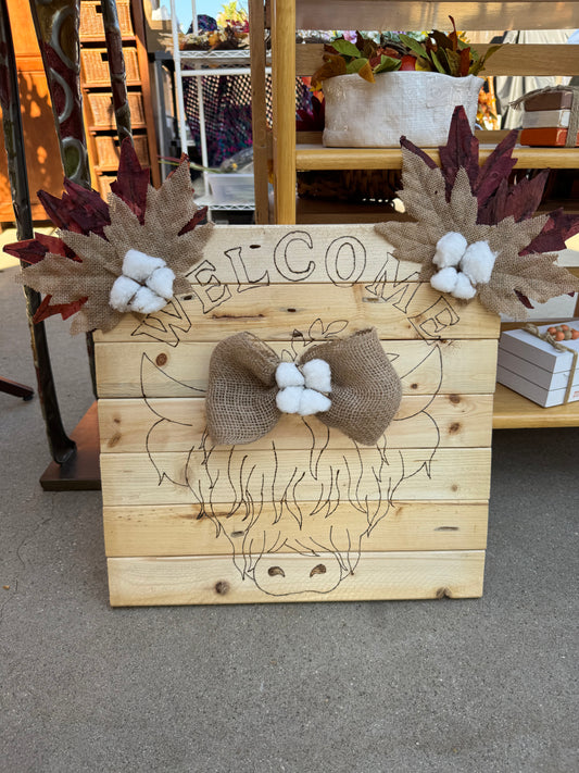 Highland cow wood burn